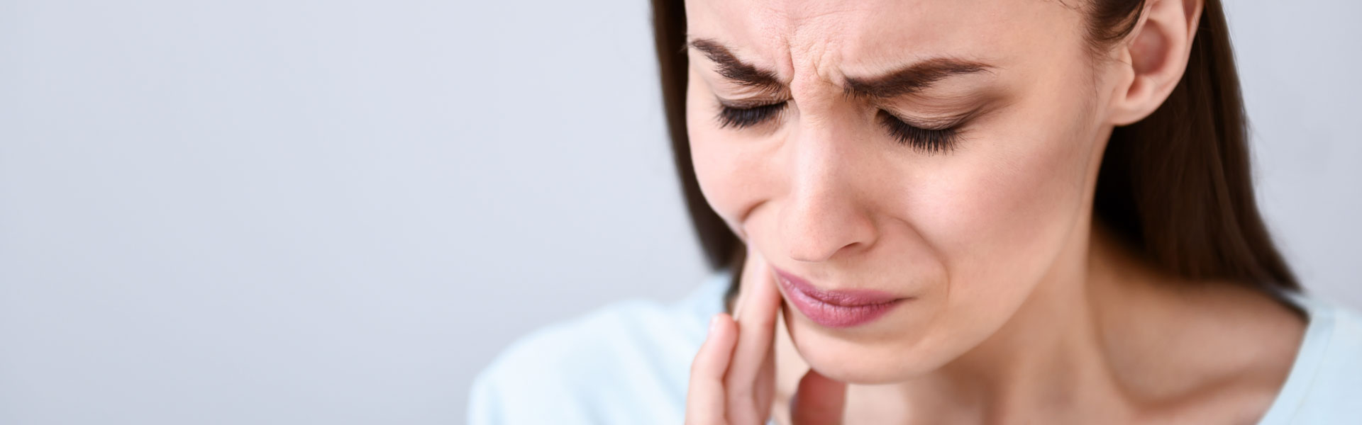 Woman suffering from toothache